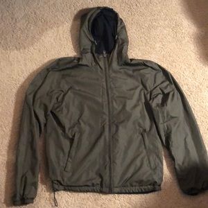 Black and green reversible rain jacket